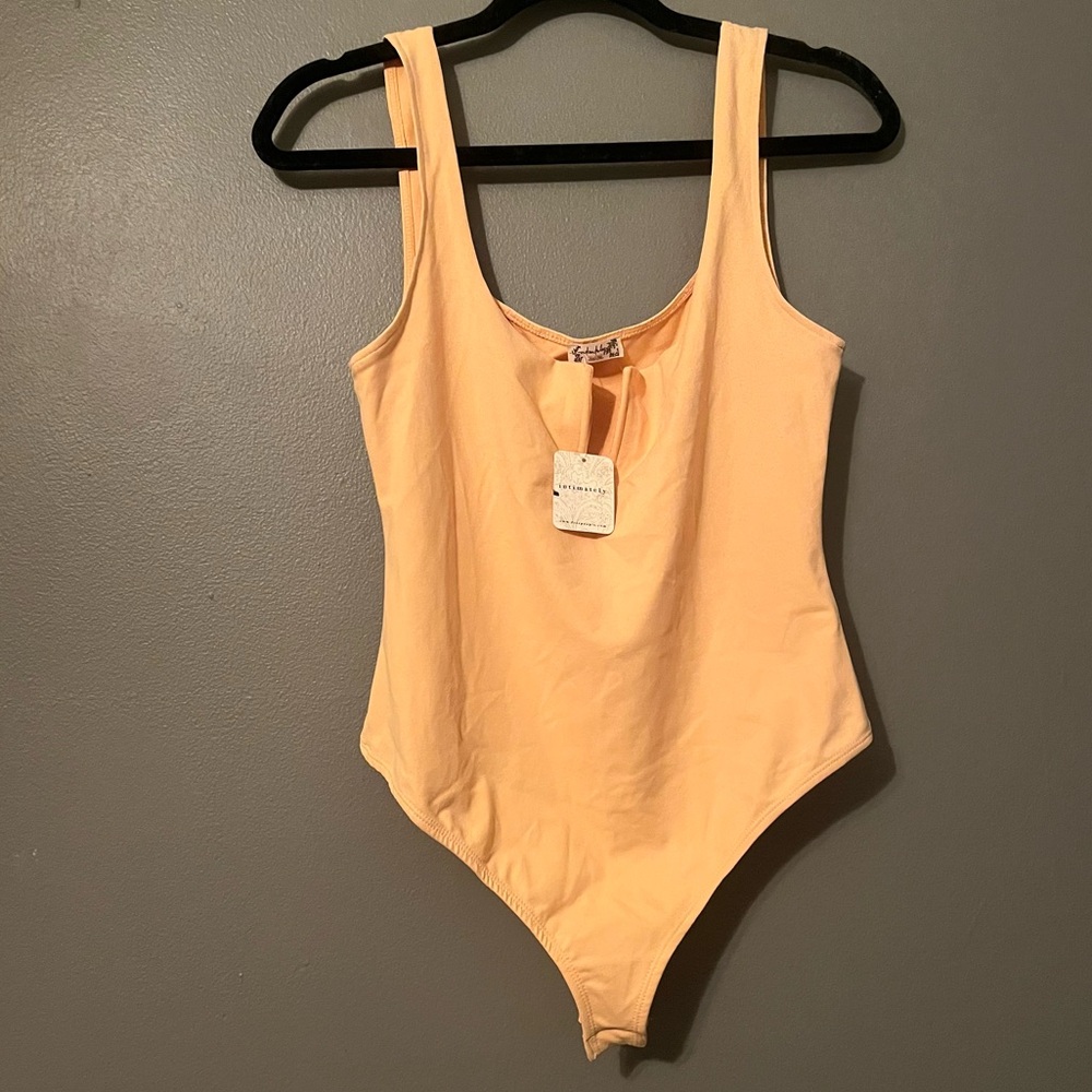 NWT Free People Sz Med Women’s V-neck Orange Sunburst Bodysuit Thong Top Ret $48
